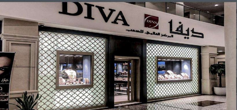 Diva International boutique with scalloped lattice façade, Madaba City Mall