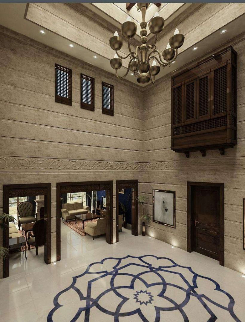 Hunaidi Villa double-height entry with carved travertine and Mashrabiya balcony, Amman